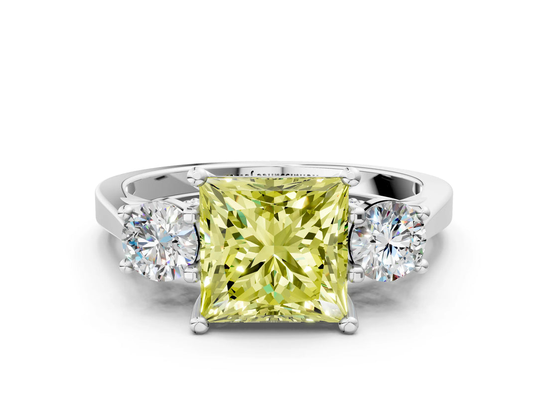 White gold Fancy Yellow Princess Cut Diamond Three-Stone Engagement Ring with Prong Setting and Pavé Band