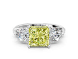 White gold Fancy Yellow Princess Cut Diamond Three-Stone Ring with Prong Setting and Pavé Band