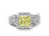 White gold Fancy Yellow Princess Cut Halo Diamond Ring with Milgrain and Bezel Accents on a Split Shank Band