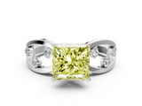 White gold Fancy Yellow Princess  Cut Solitaire Diamond with Side Stones on Criss-Cross Band and Four-Prong Setting