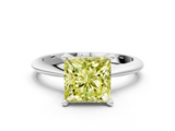White gold Fancy Yellow Princess  Cut Solitaire Ring with Four-Prong Setting on a Classic Band