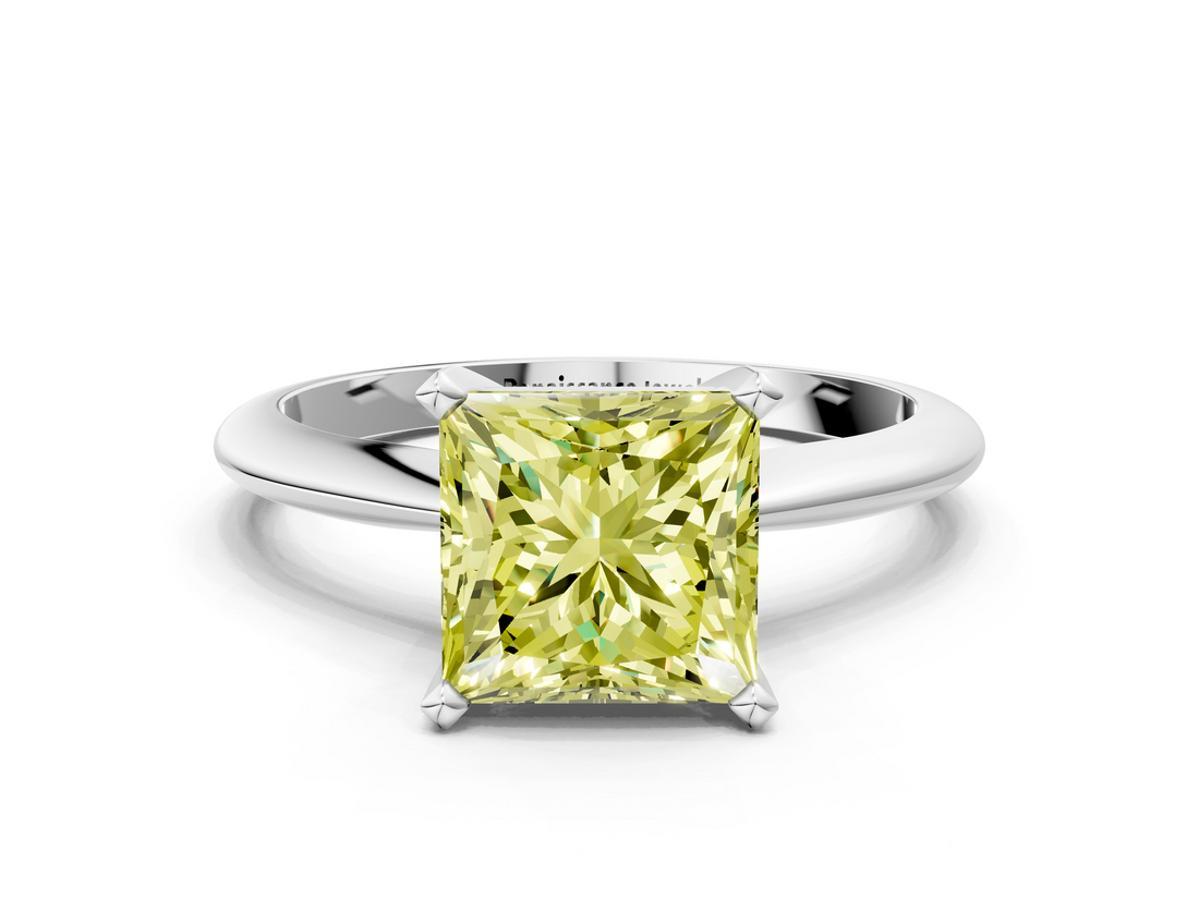White gold Fancy Yellow Princess  Cut Solitaire Ring with Four-Prong Setting on a Classic Band
