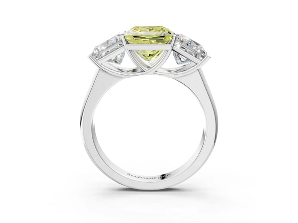 Platinum Fancy Yellow Princess Cut Three-Stone Diamond Ring with Prong Setting on a Classic Band