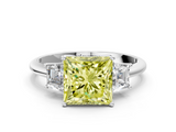 White gold Fancy Yellow Princess  Diamond Three-Stone Ring with Trapezoid Side Stones and Prong Setting