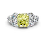 White gold Fancy Yellow Radiant  Cut Diamond Cluster Ring with Round Accent Stones and Prong Setting on a Classic Band_49