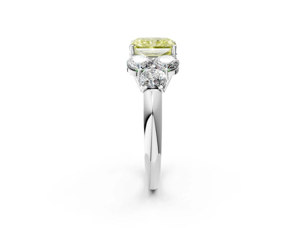 Platinum Fancy Yellow Radiant  Cut Diamond Cluster Ring with Round Accent Stones and Prong Setting on a Classic Band