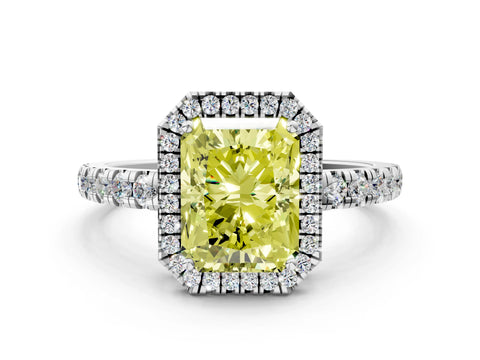 White gold Fancy Yellow Radiant Cut Diamond Halo Ring with Pavé Band and Four-Prong Setting