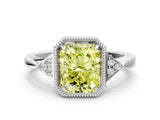 White gold Fancy Yellow Radiant Cut Diamond Halo Ring with Tapered Band and Four-Prong Setting_31