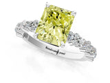 White gold Fancy Yellow Radiant Cut Diamond Side Stone Solitaire Ring with Round  and Four-Prong Setting_150