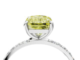 White gold Fancy Yellow Radiant Cut Diamond Solitaire Ring with Round  Pavé Band and Prong Setting_160