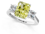 White gold Fancy Yellow Radiant Cut Diamond Three-Stone Engagement Ring with Prong Setting and Pavé Band_1