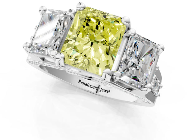 White gold Fancy Yellow Radiant Cut Diamond Three-Stone Ring with Channel Set Band and Four-Prong Setting
