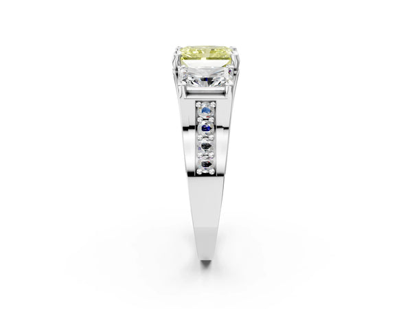 White gold Fancy Yellow Radiant Cut Diamond Three-Stone Ring with Channel Set Band and Four-Prong Setting