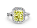 White gold Fancy Yellow Radiant Cut Halo Diamond Ring with Pavé Band and Three-Prong Setting_24