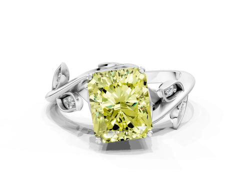 White gold Fancy Yellow Radiant Cut Solitaire Twist Engagement Ring with Leaf Accents and Prong Setting