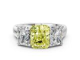 White gold Fancy Yellow Radiant Cut Three-Stone Diamond Ring with Prong Setting on a Classic Band_24