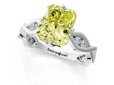 White gold Fancy Yellow Radiant  Solitaire Twist Band with Leaf Prong Setting 1