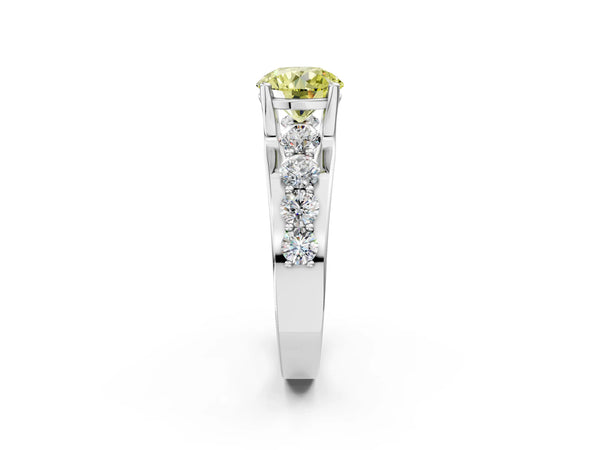 White gold Fancy Yellow Round  Brilliant Solitaire with Side Stones on a Pave Band and Four-Prong Setting