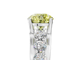 White gold Fancy Yellow Round  Brilliant Solitaire with Side Stones on a Pave Band and Four-Prong Setting_142