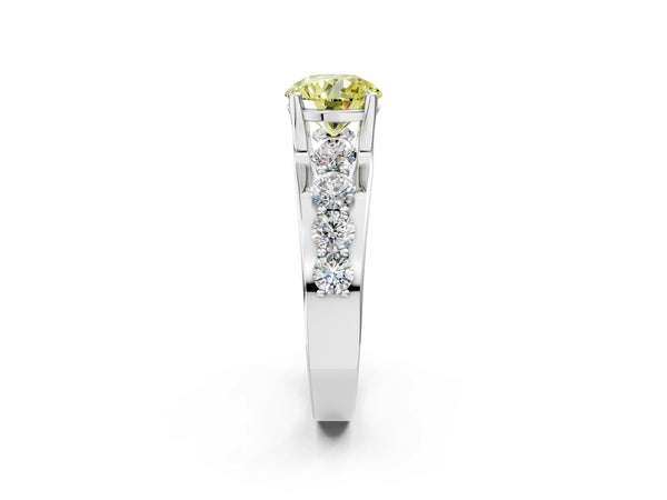 White gold Fancy Yellow Round  Brilliant Solitaire with Side Stones on a Pave Band and Four-Prong Setting