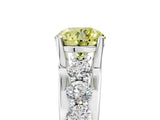 White gold Fancy Yellow Round  Brilliant Solitaire with Side Stones on a Pave Band and Four-Prong Setting_17