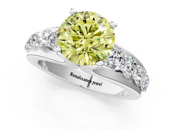 White gold Fancy Yellow Round  Brilliant Solitaire with Side Stones on a Pave Band and Four-Prong Setting