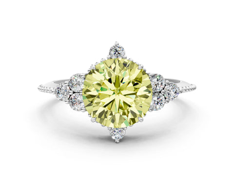 White gold Fancy Yellow Round Cut Brilliant Diamond with Cluster Setting on a Beaded Band and Four-Prong Setting