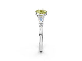 White gold Fancy Yellow Round  Cut Diamond Ring with Baguette Side Stones, Channel Set Band, and Four-Prong Setting_14