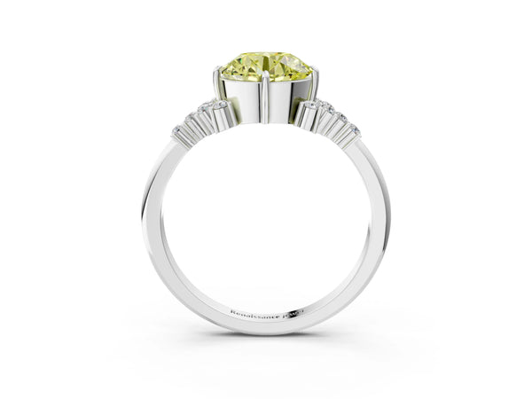 White gold Fancy Yellow Round Cut Diamond Ring with Side Stones and Four-Prong Setting