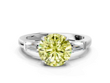 White gold Fancy Yellow Round  Cut Diamond Ring with Tapered Baguette Side Stones in Four-Prong Setting