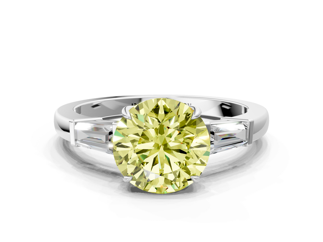 White gold Fancy Yellow Round  Cut Diamond Ring with Tapered Baguette Side Stones in Four-Prong Setting