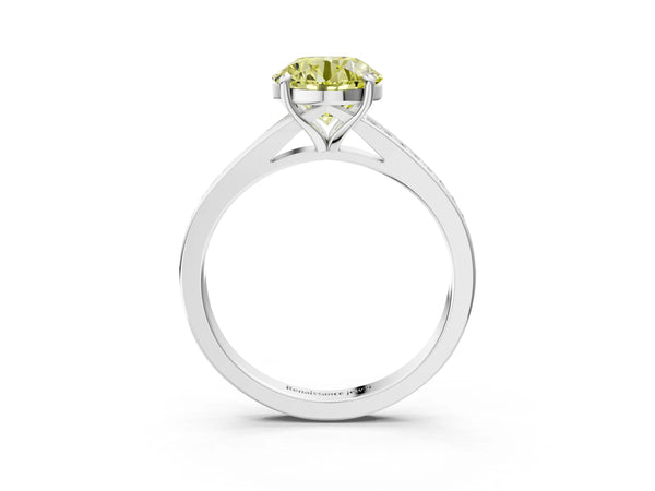 White gold Fancy Yellow Round Cut Diamond Solitaire Ring with Pavé Band and Prong Setting