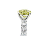 White gold Fancy Yellow Round Cut Diamond Solitaire Ring with Shared Prong Pavé Band and Four-Prong Setting_38