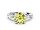 White gold Fancy Yellow Round  Cut Diamond Solitaire Ring with Tapered Baguette Accents and Four-Prong Setting