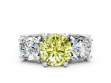 White gold Fancy Yellow Round Cut Diamond Three-Stone Ring with Channel Set Band and Four-Prong Setting_45