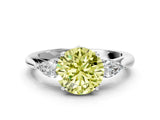 White gold Fancy Yellow Round Cut Diamond Three-Stone Ring with Pear  Side Stones and Prong Setting_174