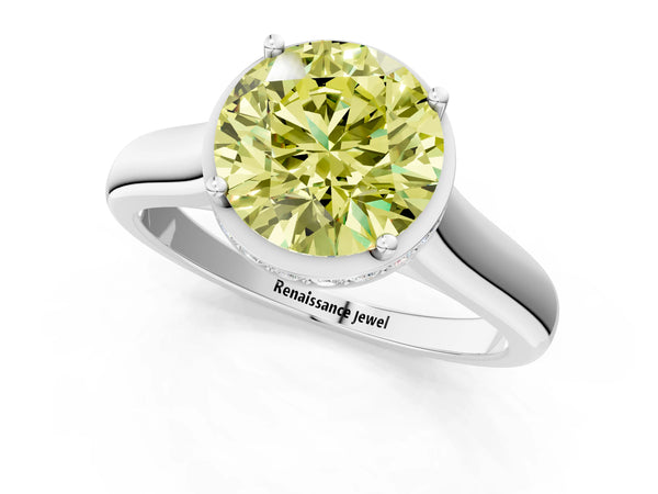 White gold Fancy Yellow Round Cut Solitaire Diamond Engagement Ring with Four-Prong Setting and Tapered Band