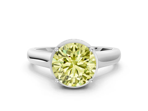 White gold Fancy Yellow Round Cut Solitaire Diamond Engagement Ring with Four-Prong Setting and Tapered Band