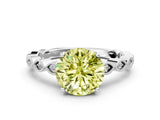 White gold Fancy Yellow Round Cut Solitaire Diamond Ring with Infinity Twist Band and Four-Prong Setting