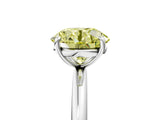 White gold Fancy Yellow Round  Solitaire Diamond Ring with Four-Prong Setting on a Plain Band_37