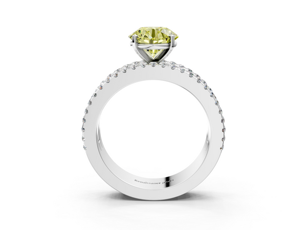 Platinum Fancy Yellow Round Cut Diamond Solitaire Ring with Pavé and Channel Set Band