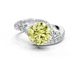 White gold Fancy Yellow Round  Solitaire with Pavé Twist Band and Four-Prong Setting