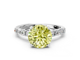 White gold Fancy Yellow Round  Solitaire with Side Baguettes and Channel Set Band