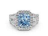 White gold Halo Fancy Blue Radiant Cut Cut Split Shank Diamond Ring with Four-Prong Setting