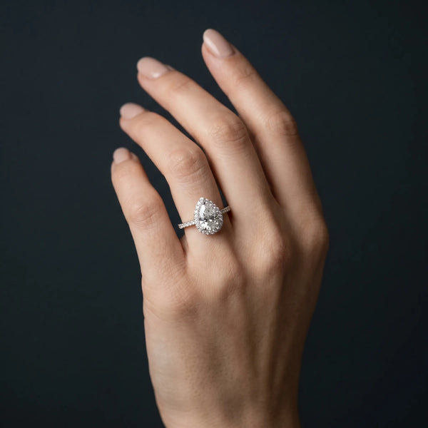 White gold Halo Pear Cut Diamond Pavé Band with Three-Prong Setting