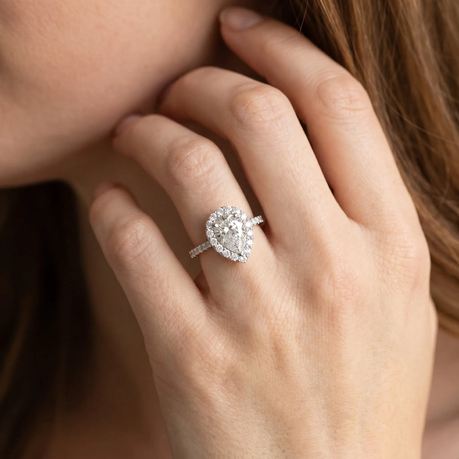 White gold Halo Pear Cut Diamond Pavé Band with Three-Prong Setting
