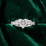 White gold Heart Brilliant Solitaire with Side Stones on a Pave Band and Four-Prong Setting_17