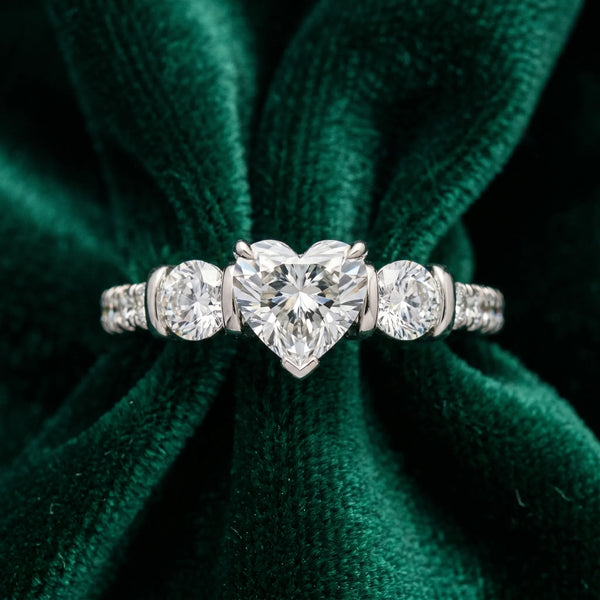 Platinum Heart Brilliant Trilogy Channel Set Diamond Ring with Bar Prongs