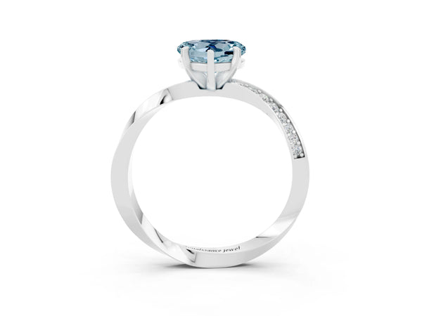 Platinum Heart Cut Aquamarine Engagement Ring with Side Stone Accents and Four-Prong Setting