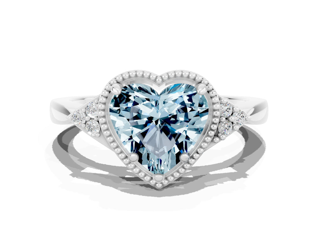 White gold Heart Cut Aquamarine Halo Ring with Tapered Band and Four-Prong Setting